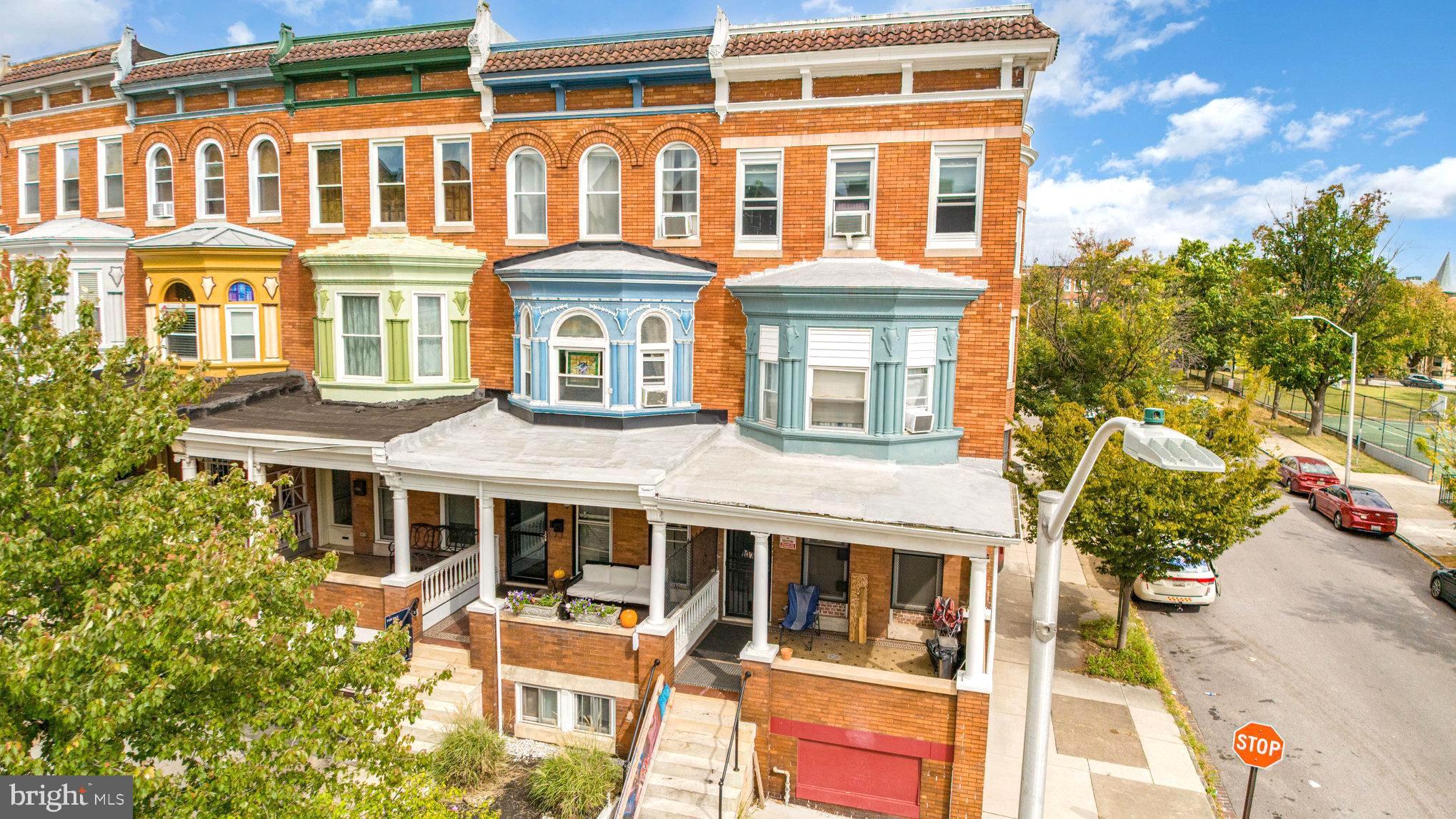 0.6 mi to Druid Hill Park & The Maryland Zoo • Private rear driveway • Finished basement with kitchenette & putting area
Classic brick rowhome in the historic Reservoir Hill neighborhood offering 5 bedrooms, 3.5 baths, and approximately 3,480 sq ft of finished living space. Built in 1911, this property blends architectural character with modern upgrades throughout. The main level features hardwood floors, exposed brick, and decorative trim, creating a timeless backdrop for everyday living. A spacious living room flows into the dining area and an updated kitchen equipped with stainless steel appliances, gas range, stone countertops, and generous cabinet storage.
Upstairs, the home offers multiple bedrooms with bright windows and ample closet space, including one bedroom with a private balcony overlooking the fenced backyard. The upper-level baths include modern fixtures while maintaining the home’s period details. The finished lower level expands the living area with a lounge, kitchenette, and putting space—ideal for a recreation room, guest suite, or home studio.
Outdoor spaces include a fenced rear yard with patio and green area, providing room for gardening or outdoor seating. A private rear driveway offers convenient off-street parking. 
Located within 0.6 miles of Druid Hill Park and The Maryland Zoo, and near Reservoir Hill Park (0.4 mi), Dovecote Café (0.3 mi), and neighborhood markets along North Avenue (0.3 mi). Quick access to I-83 via Druid Park Lake Drive (≈ 1 mi) provides easy routes to downtown Baltimore, Penn Station, and major commuter corridors.
The home offers a combination of preserved craftsmanship and practical updates, ready for modern living in one of Baltimore’s most architecturally significant districts.