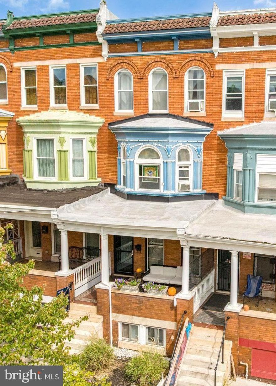 0.6 mi to Druid Hill Park & The Maryland Zoo • Private rear driveway • Finished basement with kitchenette & putting area

Classic brick rowhome in the historic Reservoir Hill neighborhood offering 5 bedrooms, 3.5 baths, and approximately 3,480 sq ft of finished living space. Built in 1911, this property blends architectural character with modern upgrades throughout. The main level features hardwood floors, exposed brick, and decorative trim, creating a timeless backdrop for everyday living. A spacious living room flows into the dining area and an updated kitchen equipped with stainless steel appliances, gas range, stone countertops, and generous cabinet storage.

Upstairs, the home offers multiple bedrooms with bright windows and ample closet space, including one bedroom with a private balcony overlooking the fenced backyard. The upper-level baths include modern fixtures while maintaining the home’s period details. The finished lower level expands the living area with a lounge, kitchenette, and putting space—ideal for a recreation room, guest suite, or home studio.

Outdoor spaces include a fenced rear yard with patio and green area, providing room for gardening or outdoor seating. A private rear driveway offers convenient off-street parking. 

Located within 0.6 miles of Druid Hill Park and The Maryland Zoo, and near Reservoir Hill Park (0.4 mi), Dovecote Café (0.3 mi), and neighborhood markets along North Avenue (0.3 mi). Quick access to I-83 via Druid Park Lake Drive (≈ 1 mi) provides easy routes to downtown Baltimore, Penn Station, and major commuter corridors.

The home offers a combination of preserved craftsmanship and practical updates, ready for modern living in one of Baltimore’s most architecturally significant districts.