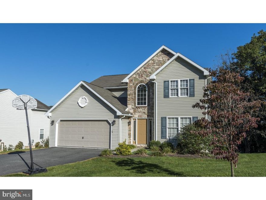 3D VIDEO TOUR.  This charming 4 BR with 2 full and 2 half baths looks as good as it does in the pictures. It has over 3300 SF of finished living area. The above grade living space is 2510 SF. There is an additional 850 SF of professionally finished living space in the lower level. Enter the home into the spacious 2 story foyer with tile flooring. To the right is the living room and dining room with hardwood floors.  The beautiful tiled kitchen (14x11) with an island flows into the breakfast room (10x13). The 1st floor family room has a gas fireplace and the sliding glass doors open to the deck. The lower level activity room (31x21) is professionally finished with tiled floors and has a half bath and a wet bar with quartz counter tops. Also in the LL is a nearly finished bonus room that could be an office or 5th bedroom. The four bedrooms upstairs are all decent size with the master having its own bathroom, walk-in closet and a second closet as well. Finish off your tour enjoying the view from the deck. Top this all off with custom made Hunter-Douglass blinds and curtains and you have a home that will make you smile. Back yard is steep initially but ends in a more level area at the bottom.