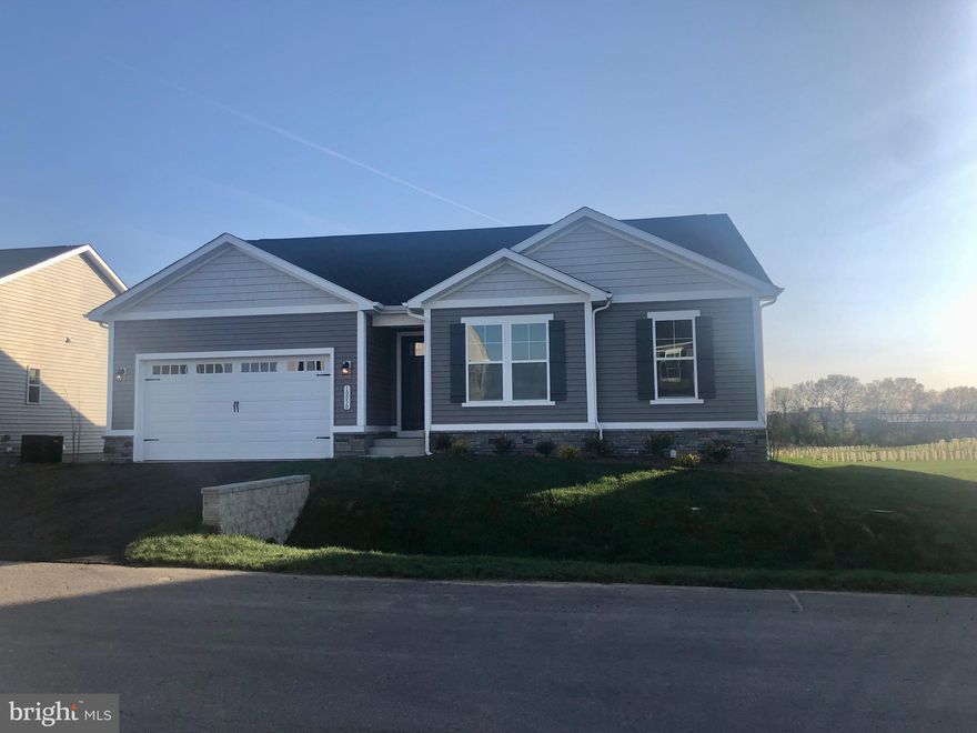 Highlights of the ranch-style Decker plan include a private study, a spacious great room and an impressive corner kitchen with a walk-in pantry, center island and comfortable breakfast nook. The elegant primary suite boasts a private bath with double sinks and an expansive walk-in closet, and the generous second bedroom and full bath are perfect for family or guests. Abundant personalization options, including a gourmet kitchen, sunroom, finished basement, covered patio and 2-car garage, truly allow you to make this home your own. Homesite backs up to open space and trees.