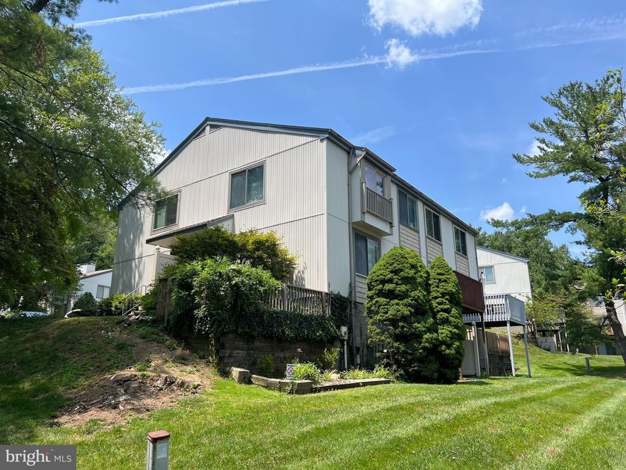 Welcome home! Enter into this beautiful townhome full of natural lighting.  This move in ready home features 2 bedrooms, 2 full baths, and a finished basement. In the kitchen you'll find stainless steel appliances with cabinets topped with granite. Across from the kitchen you'll find sliding doors leading you to the deck, allowing you to appreciate the views and weather. The top floor has two bedrooms and a washer and dryer. The primary bedroom has a spacious walk in closet and a sliding door perfect for natural lighting or some fresh air. The basement is finished with a full bathroom and you'll find another washer and dryer. It also includes another sliding door allowing for additional access into the townhome. Furthermore, this townhome comes MOSTLY FURNISHED. Location, location, location! With just a five minute drive you will arrive at the North Plaza Shopping Center and discover stores for all your needs. Come visit this while it lasts!