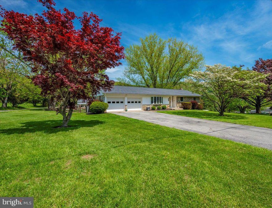 AN ABSOLUTE MUST SEE! Welcome to your dream home nestled on a spacious 1-acre lot in the highly sought-after Middletown High School district! This beautiful 4-bedroom, 2.5-bathroom all stone rancher offers the perfect blend of comfort, functionality, and breathtaking views. Car lovers, hobbyists, or business owners will appreciate the large attached 2-car garage plus a massive 40x60 detached garage/shop with a covered front porch, ample gravel parking, and 16’ & 12’ roll-up doors for RVs, boats, or equipment. On the main level, you'll find a spacious living room, 3 generously sized bedrooms, main level laundry (1st laundry room), and access to a large rear deck—perfect for relaxing or entertaining while enjoying the stunning mountain views and overlooking your fully fenced-in back yard! The fully finished basement is a true highlight—featuring a large bedroom, full bathroom, recreation area, cozy fireplace, kitchenette, walk-out patio, dedicated 2nd laundry room, and multiple storage rooms. It's ideal for multi-generational living, guest quarters, or an expansive entertainment space. Major recent updates include a new roof (2024), new HVAC system (2023), new hot water heater (2023), and septic pumped in 2023—giving you peace of mind for years to come. This home checks every box—space, versatility, updates, and a prime location. Don’t miss your chance to own a property that truly has it all!