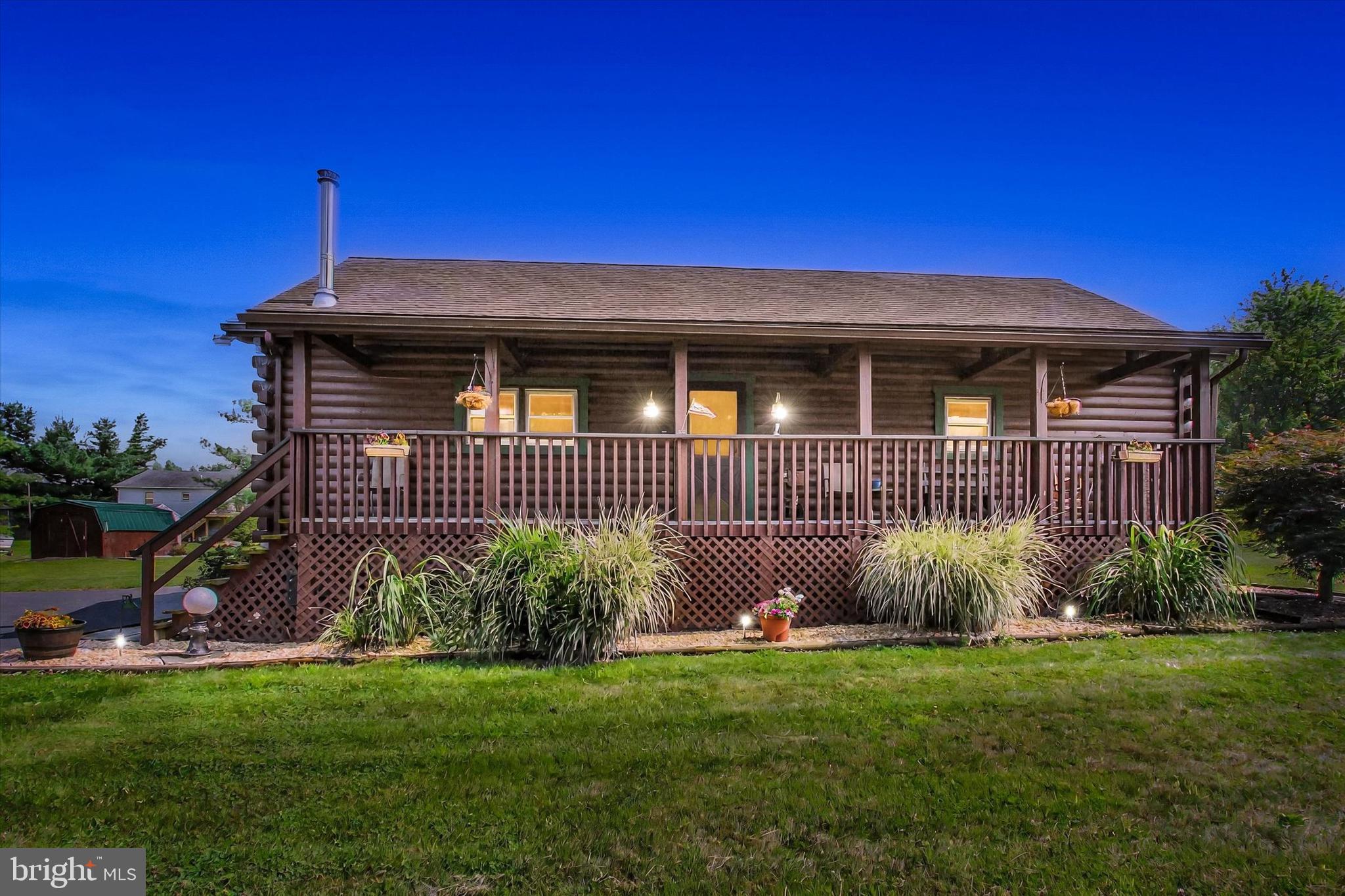 Experience the Charm of Lakeside Living in this Log Home
Welcome to your new log home at Lake Meade! This home is a rare find, boasting a double lot that spans 0.74 acres and offers a serene atmosphere of peace and relaxation. Imagine waking up every morning to the serene beauty of nature right outside your window. Whether it's the glistening waters of the lake or the majestic peaks of the surrounding mountains, the scenery here is simply breathtaking.
This log house boasts 3 bedrooms and 1 bath, a full lower level with some finished living space.
The open-concept living area is perfect for entertaining, with ample space for gatherings with friends and family. Large windows throughout the home flood the space with natural light, creating a warm and welcoming atmosphere.
Step outside and you'll find yourself immersed in the beauty of Lake Meade. The outdoor living areas are designed to enhance your lakeside experience, with spacious decks and patios where you can relax, dine al fresco, or simply soak in the views. The landscaped yard offers plenty of space for outdoor activities and gardening, making it easy to enjoy the great outdoors from the comfort of your own home.
Living at Lake Meade means you'll have access to a range of recreational activities, from boating and fishing to hiking and biking. The community here is vibrant and friendly, with a variety of events and amenities that make it easy to connect with your neighbors and enjoy a fulfilling lifestyle.
Welcome to Lake Meade, your new home in a place where natural beauty meets modern comfort. We are thrilled to have you as part of this wonderful community and look forward to seeing all the memories you'll create here.