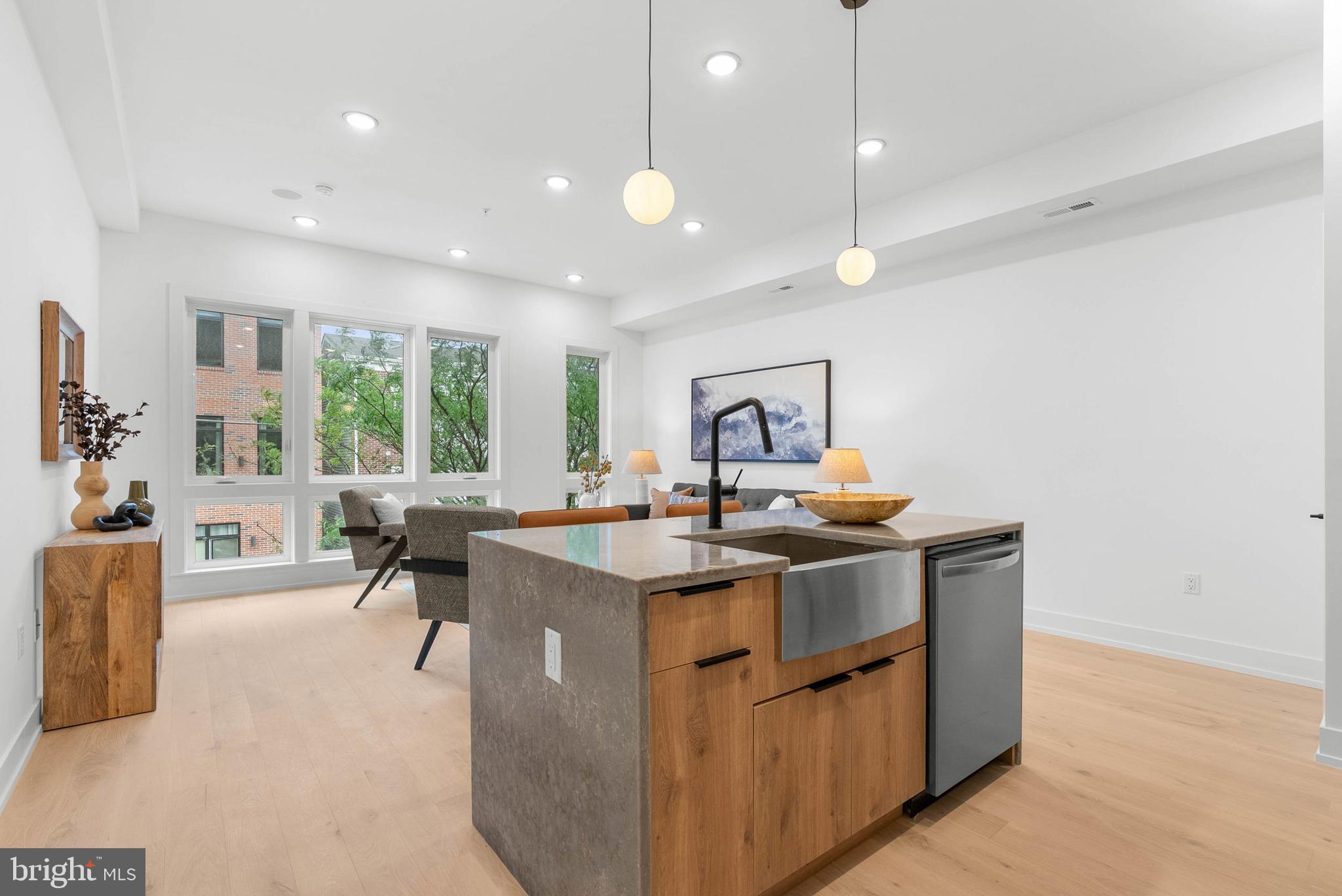 Offering 4.75% (Temporary 1 year interest rate) 2% interest rate buydown for the 1st year at ZERO cost to the buyer when using the seller/builder’s preferred lender. Experience the perfect blend of style and comfort in this brand-new luxury unit located in the heart of Olde Kensington—one of Philadelphia’s most vibrant and rapidly growing neighborhoods. Welcome to 1338 N Franklin St #C, a beautifully designed 2-bedroom, 2-bathroom unit offering spacious modern living, private parking, a private roof deck, and high-end finishes throughout. Step into the main level where you’ll find two generously sized bedrooms, two full bathrooms, and a bright, open-concept living and dining area. The state-of-the-art kitchen features sleek quartz countertops, premium wood grain cabinetry, and stainless steel appliances—perfect for both everyday meals and entertaining guests. Large windows allow natural light to pour in, creating a warm and inviting atmosphere. This thoughtfully crafted home is located just minutes from the best that Olde Kensington and Fishtown have to offer—think La Colombe Coffee Roasters, Frankford Hall, Punch Buggy Brewing, and easy access to public transit and I-95. Don’t miss the opportunity to own a truly stunning, new-construction home with luxury finishes and available parking in one of Philadelphia’s hottest neighborhoods.
