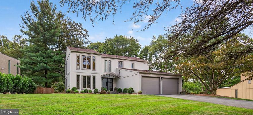 Beautifully appointed home with upgrades that will blow you away!!  Floor to ceiling windows bring in tons of light and the high ceilings go on forever.  Wolf Trap Woods offers miles of walking/running trails that lead to Wolf Trap Foundation for the Performing Arts.  Minutes to Tysons, restaurants, Metro, easy access to Rt. 7, Toll Road , 495 and so much more! Upstairs features 2 bedrooms, full bath plus a redesigned primary suite with sitting area, 2 HUGE walk-in closets and a luxurious bath with a gorgeous tub and cathedral ceilings. Fully finished lower level with huge rec room or 4th bedroom with full bath.  The peaceful backyard backs to the HOA common area.   The huge stone patio, outdoor kitchen, built-in grill and stone fireplace, all overlook the meticulous fenced landscaped yard and trees for privacy- perfect for entertainment and relaxation! Langley pyramid!