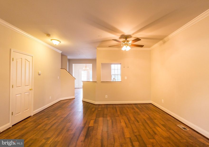 OPEN SUNDAY 1-3PM 1 A+ brick front TH in prestigious Monmouth Meadows! This designers delight offers an open floor plan w/ Eco.-farmed Pantim hardwood flooring on entire main floor,complimented by soft grays walls,Corian counters,42 inch Maple cabinets, a Sun room leading to a maintenance free deck, and is overlooking Harford Glen. Entire UL  has new carpet- pristine condition! LL has walkout...