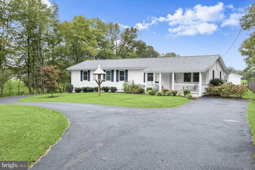 This well-maintained ranch-style home sits on 1.17 acres and has been thoughtfully updated over the past several years. Offering 4 bedrooms and 2 baths across a single-level layout, the home features an open kitchen with a center island and granite counters (2021), along with a bright living area that flows easily for everyday living. Numerous updates include a new septic system (2017), paved and resealed driveway, blown-in attic insulation, crawlspace encapsulation with drainage system and dehumidifier, and a new roof (2023). The detached 2-car garage has been insulated and equipped with a ductless heat pump (2024), adding comfort and versatility. Additional enhancements include a new water softener system, electrical panel upgrade with generator hookup, backyard patio, and refreshed front porch with railings. Together, these improvements provide peace of mind and modern convenience in a private Mechanicsville setting, with easy access to major commuter routes.