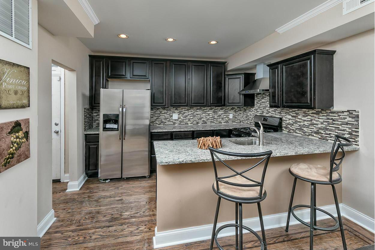 Beautifully renovated from top-to-bottom over 2,000 sqft 4brm 2.5 baths home. Featuring brand new everything!!!! Gourmet kitchen with SS appliances and granite countertop. New baths with upgraded vanities and masterful ceramic work. Gleaming HW floors throughout. New carpet, Fully finished basement,and Nice Yard