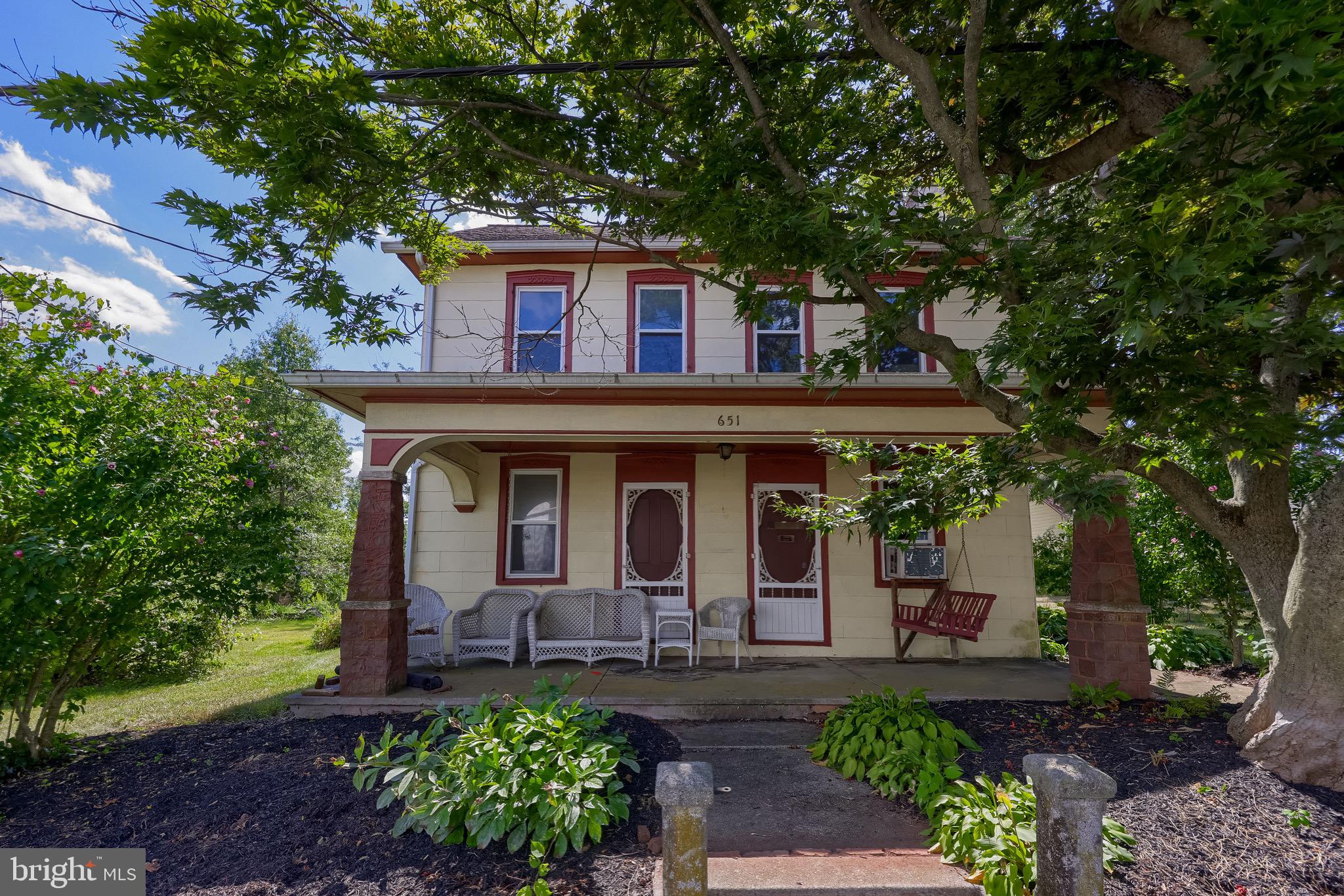 Welcome to 651 Lawn Road! This spacious 6-bedroom, 2-bathroom farmhouse in Palmyra is situated on a large .78 acre lot and blends classic charm with modern updates. Recent improvements include an updated kitchen, laundry room, main floor bathroom, and mudroom area, as well as the primary bedroom and nursery. As you step inside, you're welcomed by the new kitchen with a tile backsplash and an island. The kitchen then flows into the dining room, living room, and mudroom area, and there is also a laundry and full bath on the main floor. The second floor consists of 6 bedrooms and a full bath. There is also a large attic for additional storage! There is a detached garage, and plenty of yard space for a garden, volleyball, or simply entertaining outdoors. Make sure to schedule your showing today!
