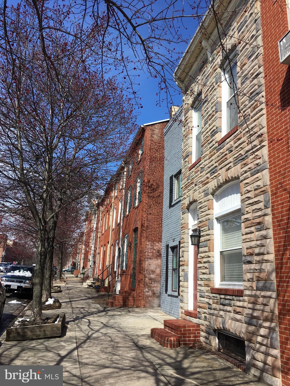 LOCATION!This beautiful tree lined street hasn't had an offer this good in a while.Home needs work to turn it over for it's next venture.Replace the carpets,or rip it up and refinish the original wood floors!Great large open 1st floor with a full bath in rear.2nd floor has two large bedrooms,exposed brick,recessed lights and a small sitting area.Recent HVAC,ROOF,H2O heater.Close to everything!