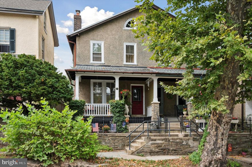 Perched on one of Chestnut Hill’s sweetest streets, this lovely 1920s twin has been meticulously maintained by its current owners. As you approach, you're greeted by the classic covered front porch, shaded by mature trees along this tranquil, tree-lined block. Step inside to the living room, where crown molding, a wood-burning fireplace, and 9-foot ceilings create a sophisticated, yet warm atmosphere. The floor plan flows seamlessly into the elegant dining room with a bay window, offering plenty of space to host dinners.  The bright, eat-in kitchen is bathed in southwestern exposure from the skylight and tall windows. The first floor also features a convenient powder room.

Outside, the beautifully designed rear garden, featuring "blue stone" paving, feels like a serene Italian retreat. With a soothing fountain along the back wall and lush perennial gardens offering tranquil privacy, it’s the perfect space to unwind or host gatherings.

Upstairs, you'll find three well-appointed bedrooms and a full bathroom. A clean, easily accessible attic (via a hall closet ladder) provides ample storage or potential for additional space. The lower level features a finished entertainment space, and the other 3 sections offer versatility, with areas for a workshop, art studio, storage, and laundry, along with direct access to the back garden. 

Located just steps from Germantown Avenue, you’re moments away from an array of local shops, restaurants, and vibrant community events, making this home the perfect blend of peaceful living and urban convenience. Come make this home yours!