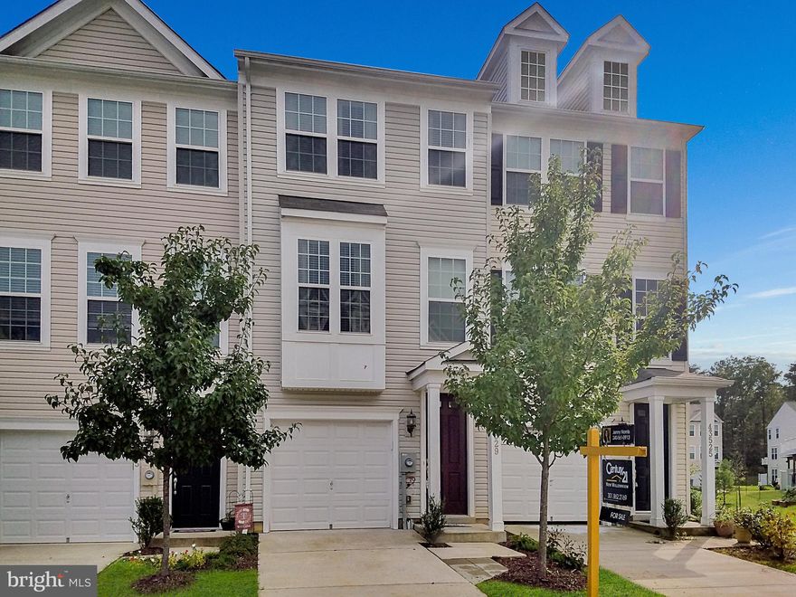 Gorgeous 3 Level Townhome in sought after Magnolia Park. Open Floorplan with Gleaming Hardwd Floors. Bright Kitchen with Granite Countertops, 42" Cabinets, Large Island, Pantry and Tons of Storage. Two Master Bedrms both with Walk-In Closets. Full Front Loading Washer/Dryer. Custom Deck for entertaining. Additional Family Rm and 1 Car Garage. HOA includes Pool, Clubhouse and Playgrounds. Lovely.