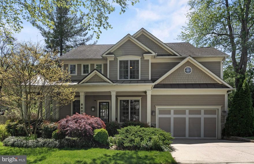 NEW ON MARKET! You'll love this newer home in the fantastic Bradley Hills/Pyle/Whitman neighborhood of Hillmead featuring a multi-function, lighted sport court and neighborhood park a block away! Relax on the wrap-around porch, take a dip in the saltwater hot tub or hang out in the family room with gas fireplace which opens to a fantastic gourmet kitchen with a Viking appliance package - this home is sure to please with it's multitude of living spaces on four finished levels. Ten foot ceilings,  oversized windows and an open concept provide tons of natural light throughout. The primary bedroom suite features a tray ceiling w/ fan, an oversized walk-in closet and a luxurious spa bath with jetted tub and separate shower.  The 4th level provides the perfect work-at-home space, teen getaway or spot for visiting relatives! The lower level with 2nd gas fireplace offers great recreational space, a 6th bedroom suite and loads of storage. A backup generator, an integrated entertainment system with 5 point surround sound in both the family room and rec room, high efficiency HVAC systems, upgraded tankless water heater, advanced CAT 5 and RG6 wiring throughout, a built-in EV charger in garage, automated lawn sprinkler system, and a state of the art security system provide peace of mind, not to mention economy and efficiency. This is truly one not to be missed!