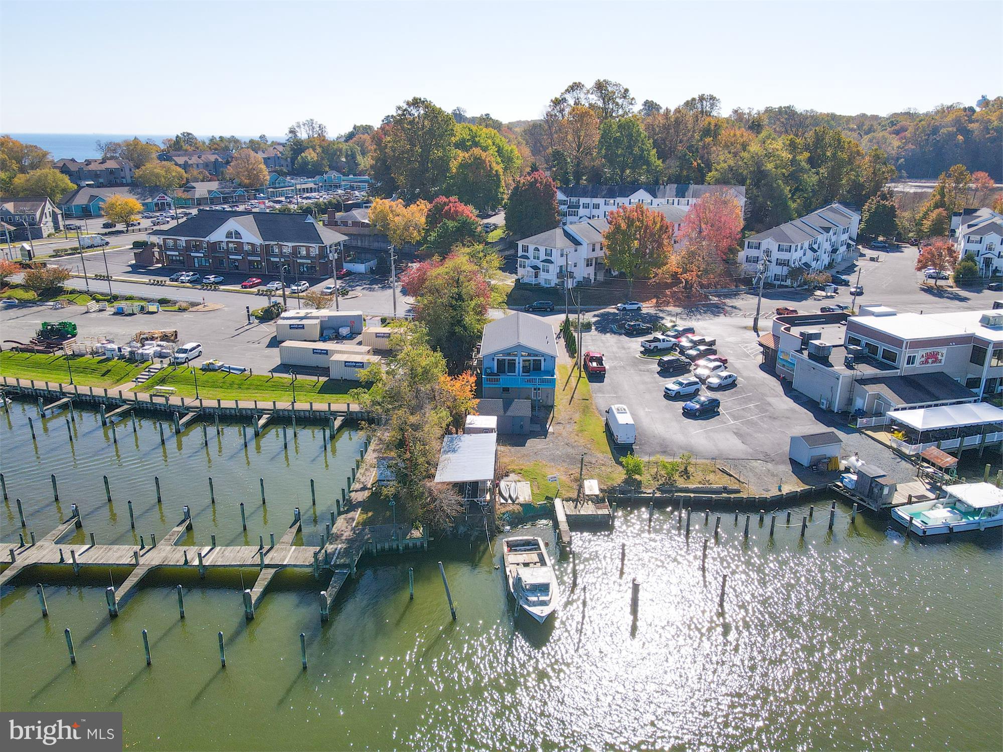 Waterfront Property zoned Marine Commercial Residential which equates to so much potential located on Fishing Creek which leads out to the Chesapeake Bay. Features include 4 boat slips, Full Shedding Operation, Walk In Box, Shed. Views of the Water from one side faces Fishing Creek to the other side which face the Chesapeake Bay. 3 Bedrooms, 1 Bath (with additional bath rough in), Beautiful Andersen Windows, Newer Roof, Newer appliances, laminate flooring, carpet in the bedrooms, newer bath/shower by Bath Fitter, Security System. Two Electrical Boxes (1 for the House and 1 for Shed, Operations and Boat Lights). Paver Driveway. The side of the house facing the creek has two large Andersen Sliders for full views of the water which leads to a full deck that was reinforced to hold the Hot Tub. New Steps with Front Access to the Property. Basement has 8 1/2' Ceilings with Access to side and back of the property.
