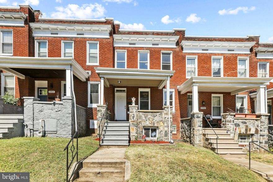 Beautifully renovated porch-front home, located across from Druid Hill Park, with easy access to I-83.  The home features spacious floorplans that combine customized features with a recent renovation.  Fully finished basement with complete in-law suite, including a full second kitchen, second washer & dryer, full bathroom and separate rear entrance.  Full garage with electricity.  Must see!