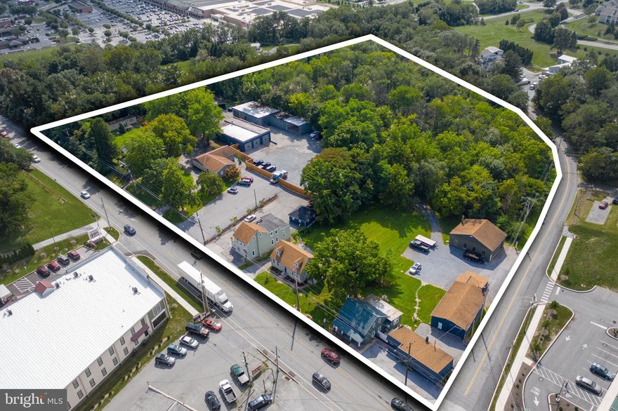 A rare combination of scale and location, this 7.5 acre Lititz, PA investment opportunity features a blended residential-and-
commercial mixed-use income stream across multiple parcels. Revenue is generated from
residential rentals, commercial/flex buildings, and garage/ storage units, resulting in
diversified cash flow across multiple sources. The major commercial leases include
annual rent escalations. The offering includes a 4-acre woods residential area with
potential future estate-home appeal, subject to relevant future approvals (and also is a
great hunting woods). Combined with Route 501 frontage and longer-term redevelopment
potential, the property offers a rare opportunity to acquire both stabilized income and
meaningful future upside in a highly desirable Lancaster County location within 2 miles of the Lancaster Airport. Buyers, please do not enter or walk around the property without consent of the Seller and without being accompanied by an Agent.