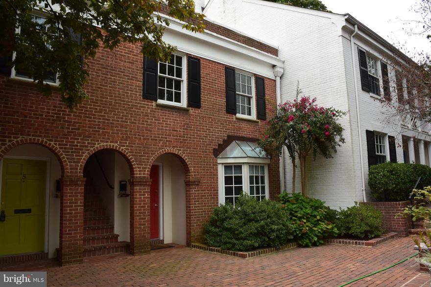 Updated two bedroom, one bath upper level unit. Lots of natural light, nice views. New kitchen with granite and stainless steel. Updated bath. Cozy wood burning fireplace in the living/dining combo. Brand new CAC. Laundry -- no charge -- and extra storage in separate building. One permit unassigned parking space. One block to King Street. Freshly painted! New carpet.Metro/bus close by.