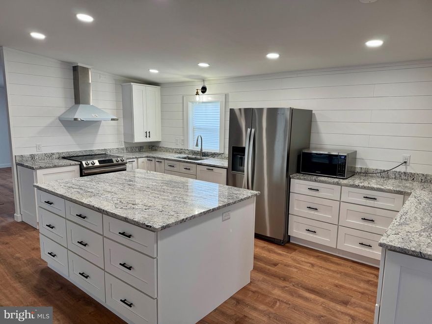 Masterfully designed and renovated 3BR, 2 BA in commuter-friendly Severn Home Park; come see the details in person - natural stone countertops, stainless steel appliances, custom tiling, designer cabinetry…luxury abounds. Make your appointment today!
Please note that the listed sale price is for the home only. Seperate lease of land is required.