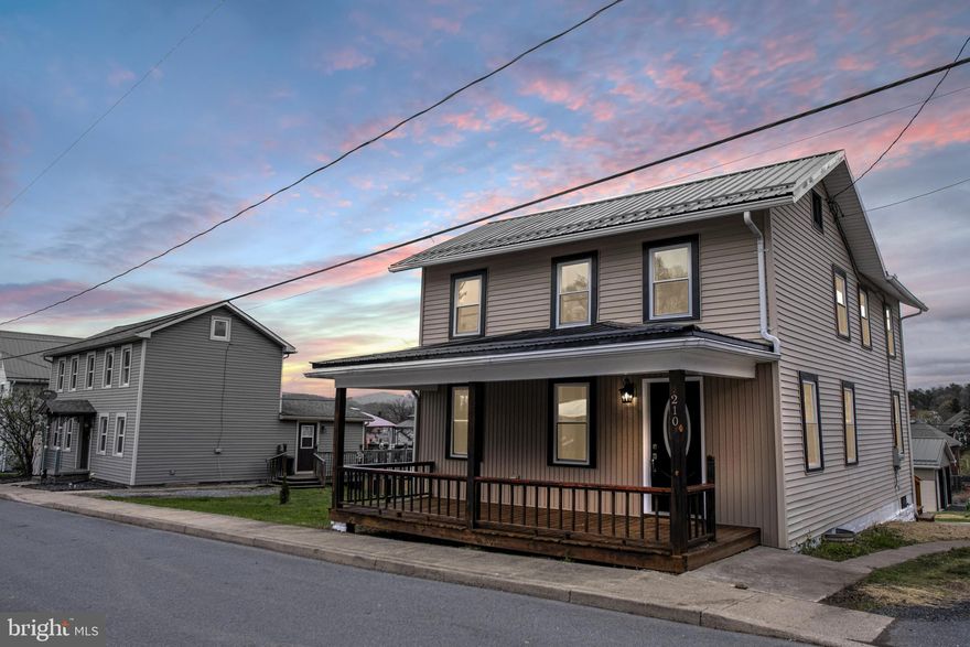 Welcome to this beautifully updated 2-story gem featuring 3  bedrooms and 2 full baths. From the moment you arrive, you'll fall in love with the home's character and modern touches throughout. Step inside to find a nicely sized living room filled with natural light—perfect for cozy nights or entertaining guests. The eat-in kitchen offers plenty of space for family meals and gatherings, with modern finishes that blend style and functionality. A full bath and convenient main-level laundry add to the comfort and practicality of the layout. Upstairs, you’ll find three bright and inviting bedrooms along with a second full bath—ideal for restful nights and morning routines. Every detail has been thoughtfully updated, including all new windows, a brand-new roof, and a highly efficient heat pump with central air conditioning to keep you comfortable year-round. Enjoy outdoor living on the  deck, perfect for relaxing or hosting summer BBQs. The oversized 2-car garage provides ample space for vehicles, storage, or a workshop. This home combines modern convenience with classic charm—it’s truly move-in ready and waiting for you!