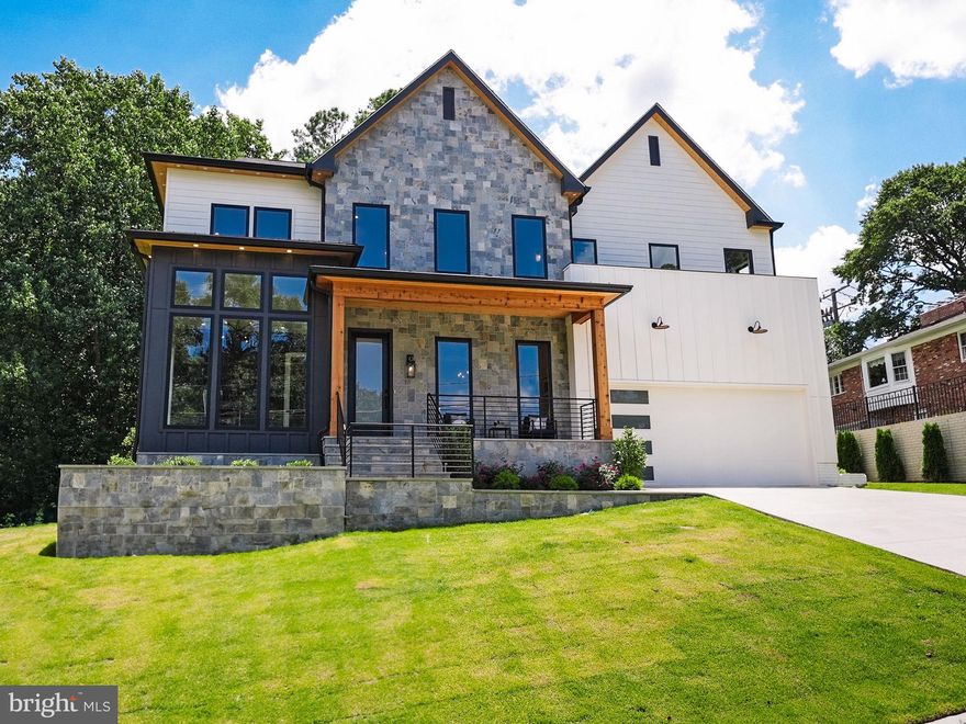 Introducing a contemporary marvel nestled within the sought-after neighborhood of Chain Bridge Forest in North Arlington. Crafted by HR Developers, this modern masterpiece stands as a testament to luxury living, offering a harmonious blend of sophistication and convenience. Meticulously designed and move-in ready, this residence presents an unparalleled opportunity to indulge in elevated living.

Boasting 6 bedrooms, 6.5 bathrooms, and sprawling across a generous 6,756 square feet, this residence exudes grandeur at every turn. Upon entry, be greeted by 10-foot ceilings and exquisite white oak hardwood floors that seamlessly guide you through the main level. A chef's dream, the gourmet kitchen is adorned with premium appliances, including a 48" Wolf range and a 48" Subzero stainless steel refrigerator.

Convenience meets luxury with a guest suite on the main level, providing flexibility and ease for residents and guests alike. Step outside to discover an outdoor oasis, complete with a rear deck and a charming screened porch, perfect for al fresco dining or simply basking in the tranquility of the surrounding greenery.

Ascending to the upper level, revel in the opulence of the owner's suite, featuring a private balcony, dual walk-in closets, and a spa-like bathroom replete with double vanities, a glass-enclosed shower, and a freestanding soaking tub—an indulgent retreat for relaxation.

The lower level of the residence offers further allure, with a spacious recreation room, wet bar, exercise room, additional bedroom with a full bathroom, and ample storage space, ensuring versatility to accommodate various lifestyles.

Notable features include a built-in elevator shaft, poised for potential future conversion, and Andersen windows that flood the home with natural light, enhancing the overall ambiance.

Ideally situated near Chesterbrook Shopping Center, Potomac Overlook, Gulf Branch Parks, and Washington Golf, residents enjoy both tranquility and accessibility. With easy access to GW Parkway and mere moments from DC, commuting is effortless. Esteemed schools such as Jamestown Elementary School, Williamsburg Middle School, and Yorktown High School further enrich the appeal of this location.

Don't miss the opportunity to experience contemporary living at its finest in one of North Arlington's most coveted neighborhoods. This residence stands as a true gem, awaiting your discerning eye.