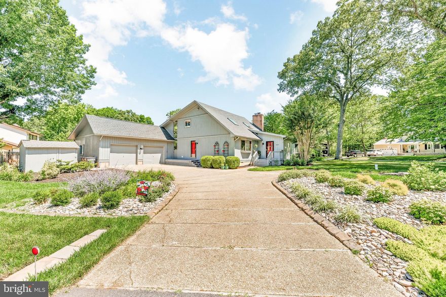 Don't miss out on this Contemporary gem situated on a level corner lot in the highly coveted community of Breton Bay's Society Hill, a true community with a voluntary HOA allowing for access to the Breton Bay beaches, pier, and pavilion, as well as community events.   Pull in to one of two concrete driveways with two car detached garage offering ample parking for guest, boats, rv’s and more.  Enter the home via the true formal foyer which leads to the family room or dining.  Family room features slate fireplace, soaring cathedral ceiling.   Kitchen is spacious and perfect for dinner parties and entertaining as it opens to the dining room.  Abundance of cabinets, large center island, wall oven,  cook top and more.  Main level bedroom with full bath, laundry room with office space and additional half bath potential for guests.   Upper level overlooks the open family room and features and additional 2 bedrooms and full bath.  Fall in love with the oasis that is  the backyard with multilevel decks, built in bbq, wooden walk ways, privacy fence, she shed.  Garage is oversized and offers room for two cars, workshop and storage space. Many recent updates and upgrades including new exterior paint, new skylights, new roof, new dishwasher and updated driveway all in 2021.  Front and side porch, new hot water heater, landscaping all done in 2022.  Newer HVAC with maintenance plan available  as well as a sprinkler system in front yard which was done in 2020.   Located in Leonardtown where there is so much to enjoy including Breton Bay Golf Course,  shopping, restaurants, historic Leonardtown Square and so much more.  Opportunity to join the Breton Bay Golf Course and Country Club offering championship 18 hole golf course, pool, tennis, social events, golf and tennis lessons, jr summer camps to help keep younger members busy and  so much more all right down the street!  See attached documents for plat and more info on the golf course and country club plus upgrades/info sheet on home and community.