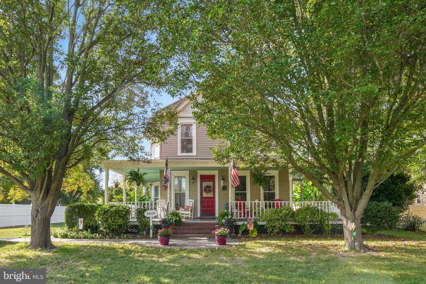 Welcome to this exquisite 3-bedroom, 2 1/2-bath Victorian gem, situated on a .49-acre lot in Parksley. This timeless residence radiates old-world charm, boasting original wooden moldings, hardwood flooring, pocket doors, and soaring 10-foot ceilings. As you step inside, a magnificent foyer adorned with a stained-glass window greets you, setting the tone for the elegance that lies within. The spacious living room offers ample space for relaxation and entertainment, leading you to the formal dining room where cherished gatherings can unfold. A dedicated office space ensures productivity and focus, while the gourmet kitchen is a culinary dream, featuring granite countertops, a large island, stainless steel appliances, a double oven, and a convenient prep sink. A charming 1/2 bath completes the main level. Ascend the spindle stairway to discover a cozy sitting area and three sizable bedrooms, including a luxurious primary suite with a private bath, perfect for unwinding in tranquility. The home provides further potential with a walk-up attic, offering endless possibilities for additional living or storage space. The exterior is equally captivating, with a wrap-around covered porch to enjoy lazy afternoons, a large rear deck for hosting memorable gatherings, and a vibrant raised garden bed for green thumbs to indulge in. A handy shed ensures clutter-free living. Conveniently located just steps away from the local library, shopping, and a park, this Victorian beauty effortlessly combines historic elegance with modern conveniences, offering an unparalleled lifestyle in the heart of Parksley. Don't miss your chance to call this enchanting property your dream home!