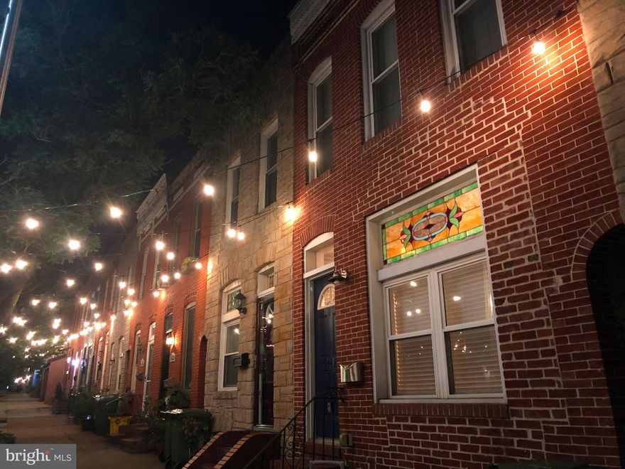 Location, Location, Location and an AWESOME property too! Situated in the quiet, tree lined 700 block of S Milton Avenue with a large roof top deck. An easy stroll  to the Canton waterfront, Fells Point or Canton Square and  just blocks away from great restaurants, shopping, services and local pubs. Widest row house on the block. Federal style, red brick, spacious open, floor plan with 3 generously sized bedrooms and 3.5 baths - 2 of which are en suite with soaking tubs. The 3rd bath is in the lower level and is dedicated to a true 3rd BR. There is a 1/2 bath on the main level which is an absolute must! First and second floors are hardwood with  tile in traffic areas - kitchen and baths. High ceilings throughout, tray ceiling in the master bedroom,  Brick accent walls, fresh neutral pallet, white chair railing and crown modeling throughout. Great gourmet kitchen, gas cooking, granite countertops, all brand new stainless steel appliances and a washer & dryer room on this level.  Sweet secluded back patio for more outdoor living. Water heater is less than 1 year old, roof is 3 years old with a  transferable warranty.  Basement has a french drain installed around entire finished perimeter.