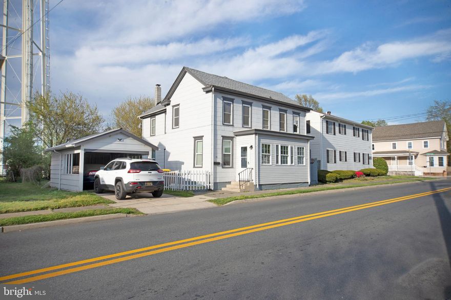 Tenant-occupied—24-hour notice required. This charming two-story farmhouse-style home is ideally located in the heart of downtown Milford. Offering three bedrooms and two full baths, the layout features a spacious living room and a formal dining room, perfect for everyday living and entertaining. All bedrooms are situated on the second level along with a full bath. The home includes a galley-style kitchen, an inviting enclosed front porch, and a rear yard for outdoor enjoyment. Additional highlights include a newly installed heating system and a covered carport. Enjoy the convenience of being within walking distance to the Riverwalk, local eateries, specialty shops, pubs, schools, and everyday essentials. Experience all that Milford has to offer, including its vibrant community events and small-town charm.
