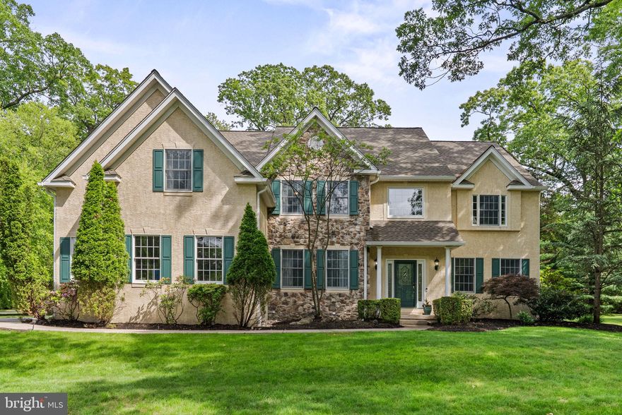 Stunning Private Luxury Estate on 0.81 Acres in Ambler, PA  Welcome to 744 Tennis Avenue — a magnificent custom-built home  by John Eichenlaub that perfectly blends timeless elegance, modern comfort, and unparalleled privacy. Nestled on a sprawling, wooded 0.81-acre lot in the Upper Dublin School District, this 5-bedroom, 4.5-bathroom, 5,200 sq. ft. estate offers exquisite craftsmanship and luxurious living at every turn.
Step inside the grand two-story foyer and be immediately captivated by the gleaming Italian marble tile floor and breathtaking circular staircase bathed in natural light. The main level features beautiful hardwood floors, a spacious formal living room, and an elegant dining room with crown moldings — ideal for both intimate dinners and festive gatherings. A dedicated study with cherry wood custom built-ins provides a perfect home office or quiet retreat.

The heart of the home is the stunning Great Room, boasting soaring 20-ft cathedral ceilings, a second grand staircase, a striking custom mirror over the fireplace, built-in TV cabinet, and an in-wall home stereo system with storage space. Expansive floor-to-ceiling windows flood the space with natural light. Adjacent is the chef’s kitchen, outfitted with new stainless steel appliances, a large granite island, a wine refrigerator, walk-in pantry, and an open layout designed for seamless entertaining and everyday living.

Step outside to your private backyard oasis—complete with a sparkling pool, hot tub, spacious patio, and lush landscaping—offering a serene retreat and perfect setting for outdoor entertaining amidst mature trees.
Upstairs, the luxurious primary suite serves as a true sanctuary. Walk through double doors into a large bedroom with a 9-ft tray ceiling and a cozy sitting area with a double-sided fireplace. The spa-inspired en suite bathroom features a jacuzzi tub, large glass shower, double vanity, and private toilet room. Custom walk-in double closets provide maximum storage and organization. This level also includes three additional generously sized bedrooms, each with ample closet space. Two bedrooms share an adjoining bathroom, while the third bedroom boasts an upgraded en suite with a newly renovated bathroom.

The beautifully designed finished lower level provides versatile flex space for recreation and relaxation, including a large fitness room, full bar, billiards area, sitting area, and two additional rooms that can serve as bedrooms, a second study, or storage. This level also features a full bathroom.
Additional highlights include a 3-car oversized garage, two-zone HVAC system, and expansive driveway accommodating 8-9 vehicles. Within the last two years, the interior was freshly painted, the roof and gutters replaced, new garage doors, pool heater, and upstairs heater installed.  (The home comes with a Home Warranty ) 
Located just minutes from downtown Ambler, Springhouse, Blue Bell, and major transportation routes (Rt. 309, Rt. 476/Blue Route, Rt. 276/PA Turnpike), as well as the train station, this home offers the perfect balance of privacy, luxury, and convenience.
Schedule your showing TODAY! 
Don’t miss the opportunity to own a stunning estate that truly has it all!