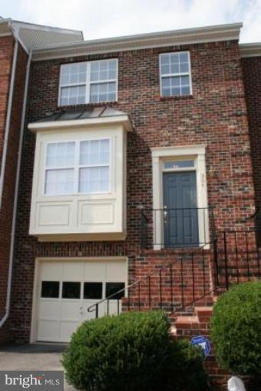 Charming Brick Garage TH in excellent condition. Ceramic foyer, Eat in KIT. Dining room  opens to spacious LR. MBR w/Vaulted ceilings, oversized shower, soaking tub & double vanities. Finished walk-out basement with laminate floors. Lg deck and fenced yard. Freshly painted, neutral. Great location: Commuter lot, stores & restauraunt.