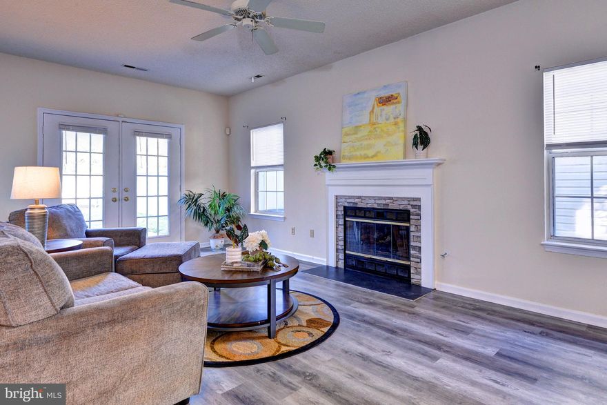 Discover a Rare Gem: Spacious 2-Car Garage Townhome in Desirable Kiln Creek! Elevate your lifestyle with this stunning, well-maintained 3-bedroom townhome in the highly sought-after Kiln Creek community. A true must-see, this beautiful property boasts a modern, open-concept floor plan flooded with natural light, perfect for both relaxation and entertaining. Step inside to find luxury vinyl plank flooring gracing the main level, complemented by plush carpeting upstairs. The heart of the home is its updated kitchen, featuring sleek granite countertops, a convenient breakfast bar, and newer stainless-steel appliances that make meal prep a breeze. Unwind in the spacious family room, complete with a cozy gas fireplace that adds warmth and charm. Outside, enjoy a nicely landscaped corner lot with large, fenced in yard in a vibrant community brimming with amenities, including a clubhouse, refreshing pool, and scenic golf course. Kiln Creek’s prime location offers easy access to I-64, nearby military bases, and all the best of Hampton Roads, making it ideal for commuters and those on the go. Don’t miss out—this rare full-size 2-car garage townhome won’t stay on the market long!