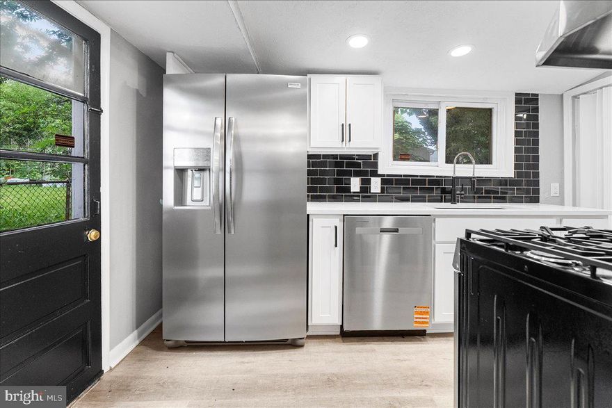 Priced To Sell Fast! Highly Sought After Renovated Rambler, Spacious Kitchen with QUARTZ Counters, Stainless Steel Appliances, Modern Tile Backsplash, New Cabinets, Spacious Bedrooms, Updated Bathroom, New Flooring, New Lighting, Brand New HVAC, Fenced Backyard, Much More!!  Close to Schools, Shopping, Metro, and Commuter Routes.  This Will Not Last!