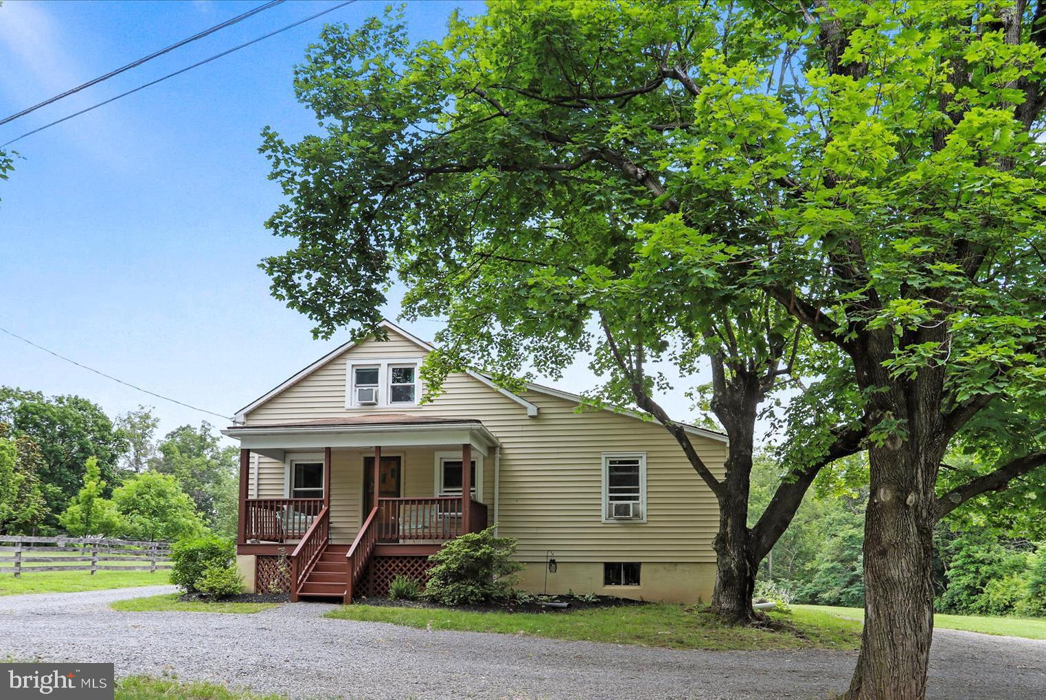 COUNTRY CHARMER! want to live in the country be still have the conveniences, then here it is.
Wonderfully maintained home on an acre of LEVEL land. The shade tree lined circular drive fronts the paved county lane that takes you to Winchester VA in about 1/2 hour. When you enter the house from the covered front porch, you'll find a comfortable living room ready for relaxing. Authentic hardwood floors throughout, new windows, fresh paint. Nice size Eat in Kitchen with a separate dining room. A bedroom on each floor for privacy, the primary bedroom is on the main floor with bathroom almost connecting, the 2nd floor bedroom has a connecting study, the lower-level bedroom is large with 3 windows and 2 entrances making it ideal for grown children or quest. As an added benefit "The Cabin" serves as a unique entertainment feature for outdoor gatherings but it has storage for your ATV's, and enough room under the roof for 3 additional vehicles and that comes in handy for those snow and hailstorms. For the outdoorsman its very close to the Cacapon and Potomac Rivers and also the Public Hunting Lands. If you have or want an RV there is graveled parking area just for it. This home is not a flip job, its just been well taken care of through the years! NO HOA HERE. Don't let this one slip by.