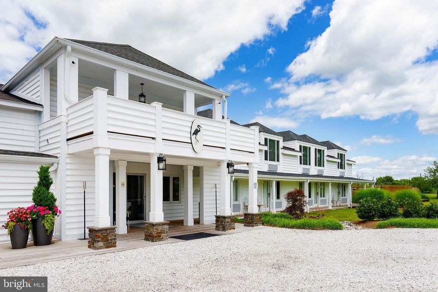 *A Once-in-a-Lifetime Chesapeake Bay Waterfront Offering – The Iconic Tilghman Island Inn* 

NOTE: Has public sewer and well. 

Welcome to a rare opportunity to own one of the most beautiful, fully reimagined waterfront hospitality properties on Maryland’s Eastern Shore. Set on five acres with sweeping views of the Chesapeake Bay, the Tilghman Island Inn is that extraordinary blend of romance, lifestyle, and investment that rarely becomes available. Established more than 50 years ago, the Inn has been transformed from top to bottom through a meticulous, comprehensive renovation. Today, it lives as a boutique luxury retreat with 20 uniquely designed guest rooms (five with gas fireplaces), a full-service waterfront restaurant and bar, expansive outdoor dining terraces, a sparkling 20' x 40' pool, lush gardens, and expansive private docking with the relaxed charm and quiet sophistication that define the Chesapeake Bay. Guests return year after year for the Inn’s serenity, sunset views, on-site dining, and proximity to St. Michaels, Easton, and Annapolis. For buyers, the value is just as clear: major improvements are already complete, systems are up to date, and recent guest ratings average about 95% across major travel platforms. Whether you envision this as a turnkey boutique hotel, a private family compound, a luxury event destination, or a future waterfront condominium development, the property is positioned for success. The Inn is legally configured as 20 residential condominium units offering flexibility. Property Features: 5-acre waterfront property, 15,000+ sq. ft. hotel and restaurant, 345 ft. vinyl seawall, 20 x 30 ft. T-Dock, 175 ft. floating dock with 7 additional boat slips, 20 uniquely designed guest rooms, 20 x 40 ft. in-ground pool, 30 x 12 ft. fully functional greenhouse, and Lush ornamental and raised bed vegetable gardens For investors seeking a premier turnkey hospitality venture or a high-value waterfront development opportunity, the Tilghman Island Inn presents a rare chance to own an Eastern Shore gem with limitless potential. **NOTE: FOR BROCHURE & VIDEO CONTACT AGENT**