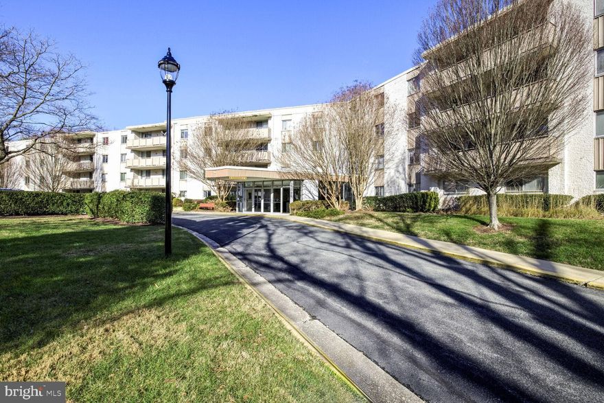 This rarely available corner unit overlooking the lake is a bright and spacious 1,220 square foot home. 
 Designed with an open concept living area that seamlessly extends to a large, private balcony with an amazing lakefront view —perfect for relaxation or entertaining guests. The home boasts fresh paint, new carpet in the living, dining, and bedroom areas, new vinyl tile flooring in the kitchen and foyer, and ceramic tile in the bathrooms.  Enjoy the updated bathrooms, including an en suite in the primary bedroom. The spacious primary bedroom also has a walk-in closet. The living room features two sliding glass doors that lead to the 19' balcony, enhancing the indoor-outdoor flow. A separate dining area complements the updated kitchen, which includes white appliances, ample cabinetry,  and a pantry. The property includes a separately deeded parking space and plenty of guest parking. Lakeside Terrace offers on-site property management, a meeting room, an outdoor pool, a tennis court, and a picnic area with a serene lake view. It is conveniently located next to Cabin John Regional Park and the Pauline Betz Addie Tennis Center, with easy access to I-495 and I-270. The Grosvenor and Medical Center Metro Stations are about 3 miles away. Cats permitted. FHA approved. Unfortunately, it's not possible to install washers/dryers, but there is a laundry room on each floor. Don’t miss the chance to make Lakeside Terrace your new home!