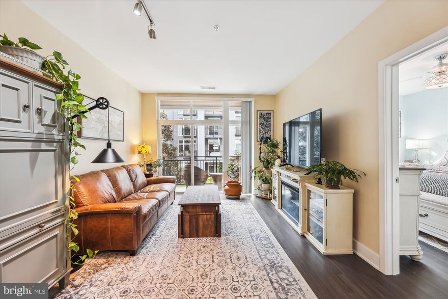 Step into our listing in National Harbor and be amazed by this dazzling condo unit! Located at The Haven, this 1 bedroom, 1 bathroom abode sets itself apart from the rest with open concept space, an eat-in kitchen, en-suite bathroom, and a balcony overlooking a private courtyard. The light flooding in from the large windows and sliding glass door really opens up the square footage and makes this cozy unit feel spacious! Oh, did we mention there's a washer and dryer in the unit? It just keeps getting better! And we haven't even started on the amenities that The Haven has to offer. This includes a fitness center and yoga studio, a pet grooming spa, co-working spaces, a fenced-in outdoor pool, a gorgeous clubhouse available for private events, a private courtyard, and a covered garage. All of that, included in a condo fee under $475? It all sounds too good to be true! Well it's not, we've got 145 Riverhaven Drive, Unit #256 right here, just for you!