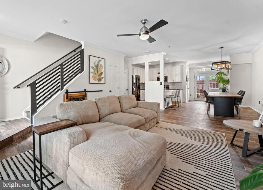 **Offer deadline Monday, 8/21/23, at 5PM** End your home search with this beauty! This turn-key two-level condo lives like a townhouse and truly has it all. Prepare to be blown away by the updates - tastefully designed down to every detail. Enjoy the open floor plan and chef’s kitchen loaded with all new stainless-steel appliances - refrigerator (2022), stove (2022), microwave (2022), dishwasher (2023), new backsplash (2022), new kitchen faucet (2023), newer quartz island countertop, and ample cabinet space. Updated main level powder room. Step out to your private patio to enjoy some fresh air. Under the staircase you’ll find extra space enclosed by a custom barn door - perfect for storage or a cozy lounge area for your furry family member. 

Take note of the modern banister (2022) as you make your way upstairs where you’ll be greeted by 2 oversized bedrooms, each with their own private bathroom. The first bedroom offers new carpet (2022), a custom-built king-size murphy bed (2022), brand new bathroom (2022), and a generously sized walk-in closet. Down the hall you’ll find the luxurious primary suite which features a den, walk-in closet, brand new bathroom (2022), and private balcony.

1-car garage with built-in storage and driveway space. Laundry on the upper level - washer and dryer (2021). Newer A/C and furnace, newer hot water heater.

Unbeatable location near major routes 395 & 495. Close to DC, Old Town, Arlington, the Pentagon, Reagan airport. Take advantage of everything Cameron Station has to offer – community pool, recreation center, gym, Brenman Park, jogging trail, shops/restaurants, seasonal farmer’s market on Sundays, and so much more. Welcome home!