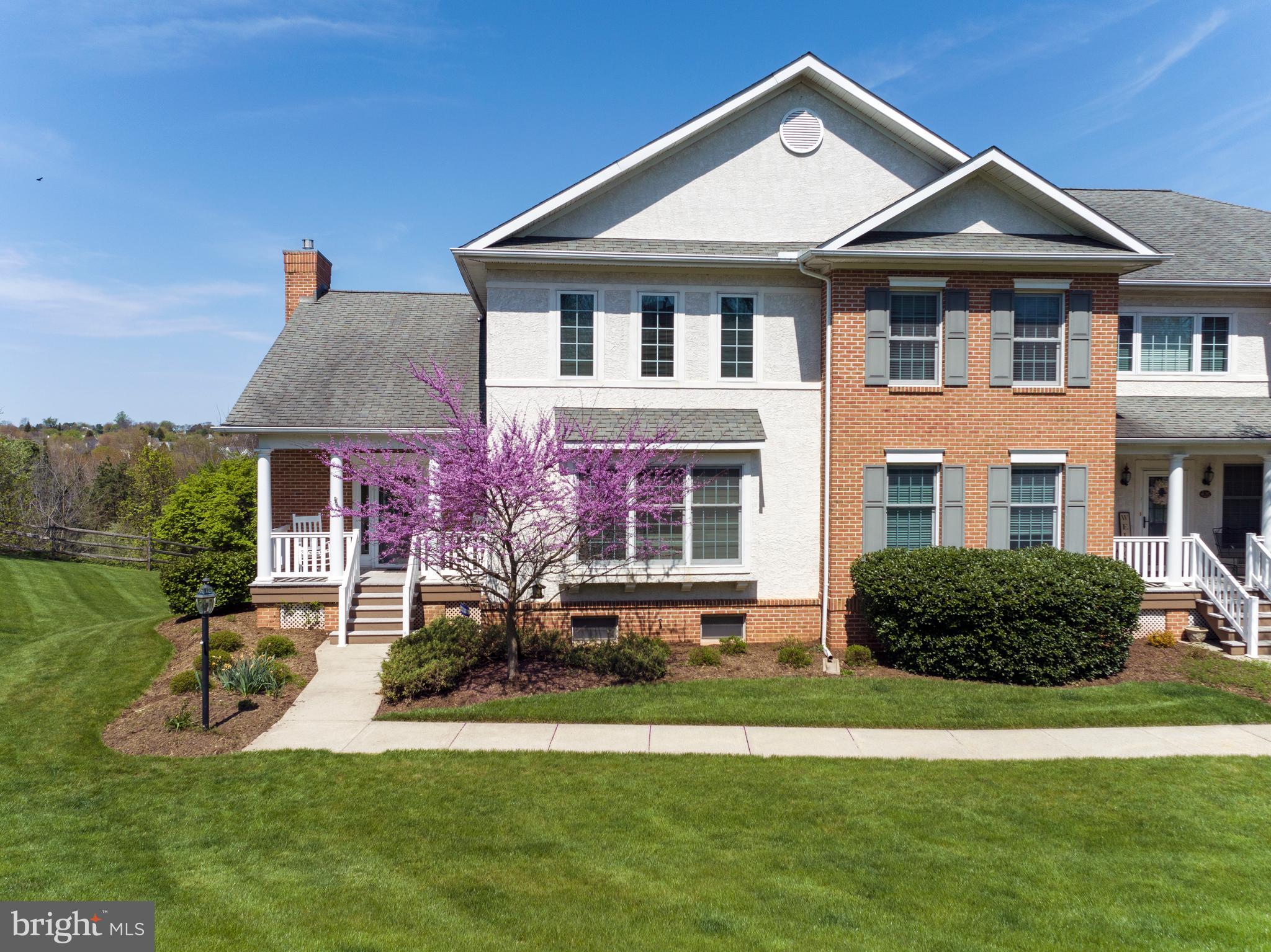 Located on one of the best private lots in Eagleview, this impeccably maintained Yardley Model End Unit boasts 3 spacious bedrooms, 2.5 baths, plenty of natural light, hardwood floors throughout main level, and has been freshly painted. The open floor plan features a stunning 2-Story Great Room with large arch-topped windows, gas fireplace, dining area, powder room, laundry room with stunning views from the rear deck. The gourmet kitchen is equipped with stainless steel appliances, gas cooking, and under-cabinet lighting. The Spacious 1st floor Master Suite includes a triple window with a window seat, and two walk-in closets. The Master Bath features a soaking tub and stall shower. Second floor hosts a balcony that overlooks the Great Room, 2 bright Bedrooms with walk-in closets and a full bath. The finished basement has a bathroom and leads to the rear patio and oversized 2 car garage. HOA includes common area maintenance, lawn maintenance, snow removal, community pool, playground and tennis courts. Located in the award-winning Downingtown Area School District and within walking distance to Eagleview Town Center which includes Restaurant Row, Shops, and Summer Concerts.