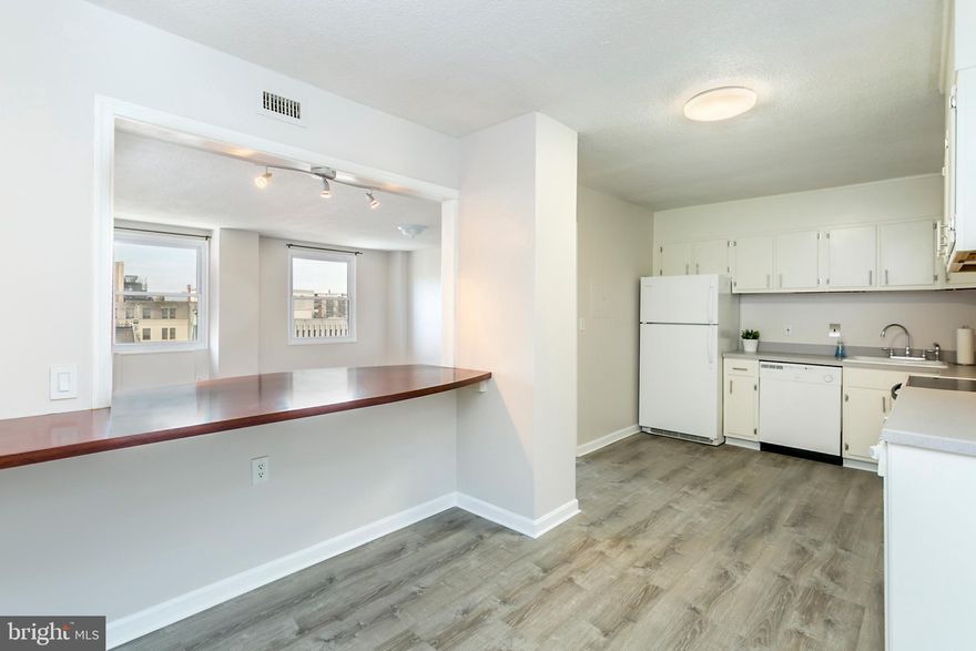 Largest floorplan in the building.  Super size eat-in kitchen with large breakfast bar.  Full-size Washer Dryer in-unit!  Huge walk-in closet plus two additional closets in master bedroom.  Hardwood flooring throughout.  Full-service secure elevator building has 24-hour front desk and parking attendant, on-site manager and deli/convenience store.  Parking available in attached underground garage for additional fee.  Superb location in heart of arts and cultural district, just blocks from Penn Station.  Many dining, nightlife, and shopping options in the area.