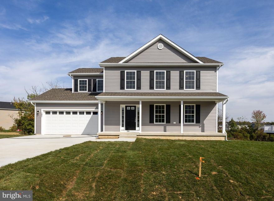 IMMEDIATE DELIVERY. Great family home situated well established neighborhood. Great commuter location and convenient to schools & shopping. Kitchen has granite countertops with island and is open to family room. LVP flooring in  foyer, dining and Kitchen area.  Living room has carpet. 10 X 12  deck with vinyl rail and accessible from the kitchen for easy grilling or enjoying your morning coffee.   This home features 3 large bedrooms and a primary suite with tray ceilings on the upper level.   All bedrooms have standard fan/lights. Primary bath has ceramic flooring and ceramic surround in oversized shower with seat, glass doors and a walk in closet.  Laundry room on bedroom level with tiled flooring. Walk out basement with plumbing for future 3rd bath. Two car garage which is insulated, lots electrical outlets, insulated garage door and opener.    Tons of standard features that other builders charge for as options. 2 X 6 walls and dual heat pumps for energy efficiency.  As with all new construction, WV transfer taxes are paid by Purchaser.