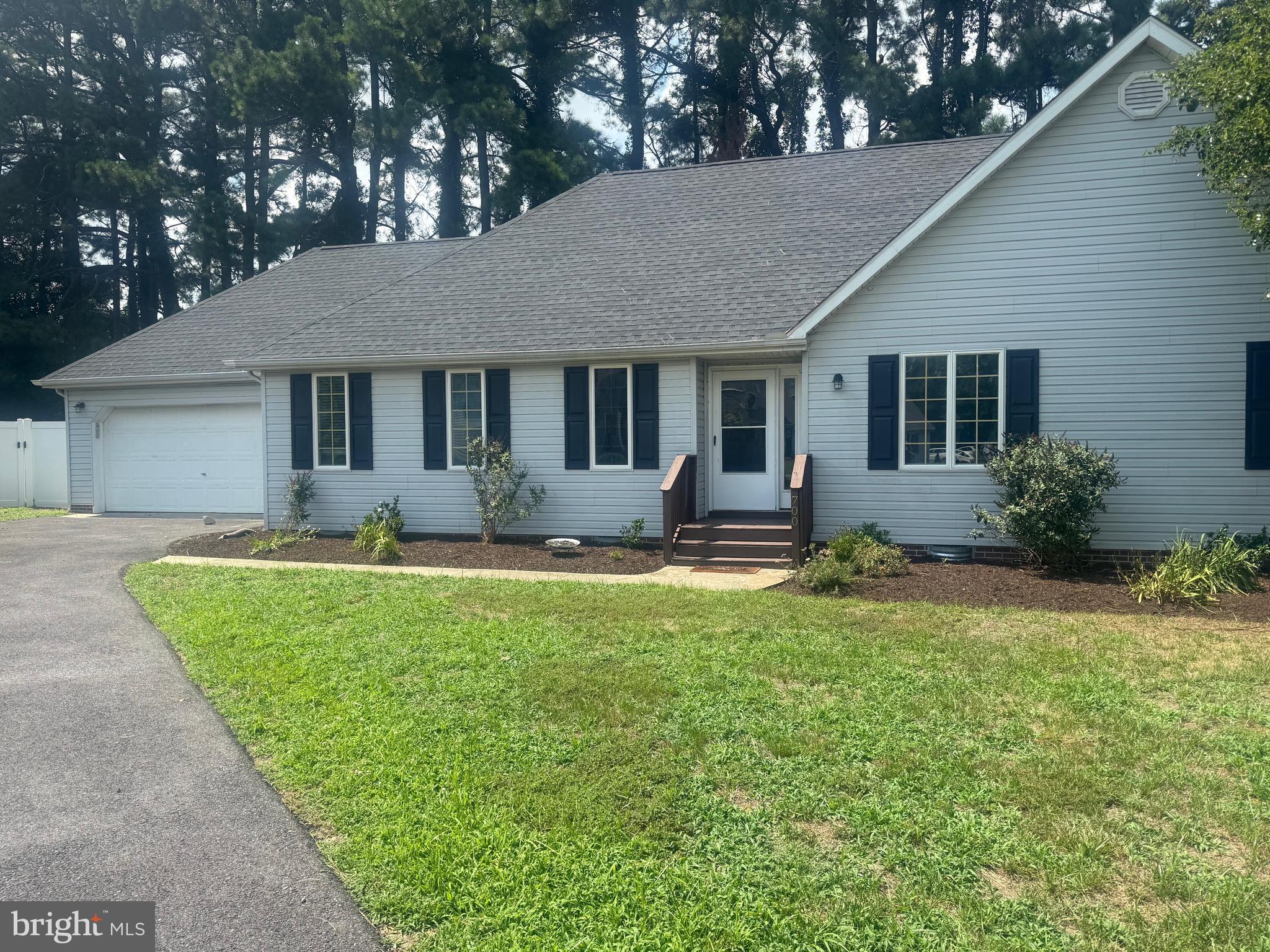 This wonderful, one story home is living at it’s best! Plenty of yard to spread out and fenced in for privacy with deck and fire pit to enjoy. Located in a convenient quiet community on a cul-de sac and is close to hospitals, groceries ,restaurants and entertainment. The front door opens into a home that has luxury vinyl planks throughout.Off f to your left is a lg dining rm that could also be made into an office, living rm etc. Straight ahead is a large family room that connects to the kitchen. The kitchen features lots of white cabinets, stainless steel appliances, recessed lighting, front loading Samsung washer and dryer , brand new water heater and nice size space for kitchen table /mud room area. There is a door from this kit/mud rm space to the 2 car garage. The lovely hall bath includes a tile shower with glass barn doors, tile floor and new sink and faucet! Each good size bedroom has new carpet and generous closet space. Master bath has fiberglass tub/shower combo with rain shower head. Freshly mulched and painted inside, just waiting for new owner. OPEN HOUSE SATURDAY JULY 12 FROM 11-1