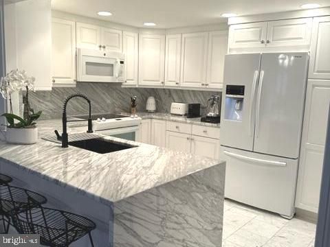 1080 WISCONSIN AVENUE NW 103/104 WASHINGTON DC 20007