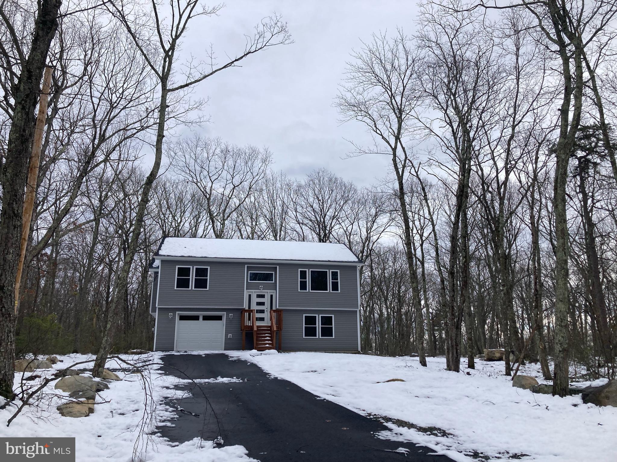 Newer construction nestled within the Conashaugh Lakes Community. Home features 3 bedrooms, 2 full baths, quartz countertops, and custom built cabinets in the kitchen. The two story home is well positioned on a little over an acre lot. The back deck has a scenic view of the surrounding wooded areas. The quaint downtown of Milford is also nearby. Looking to get away from all the hustle and bustle then call or text to come see the home today.