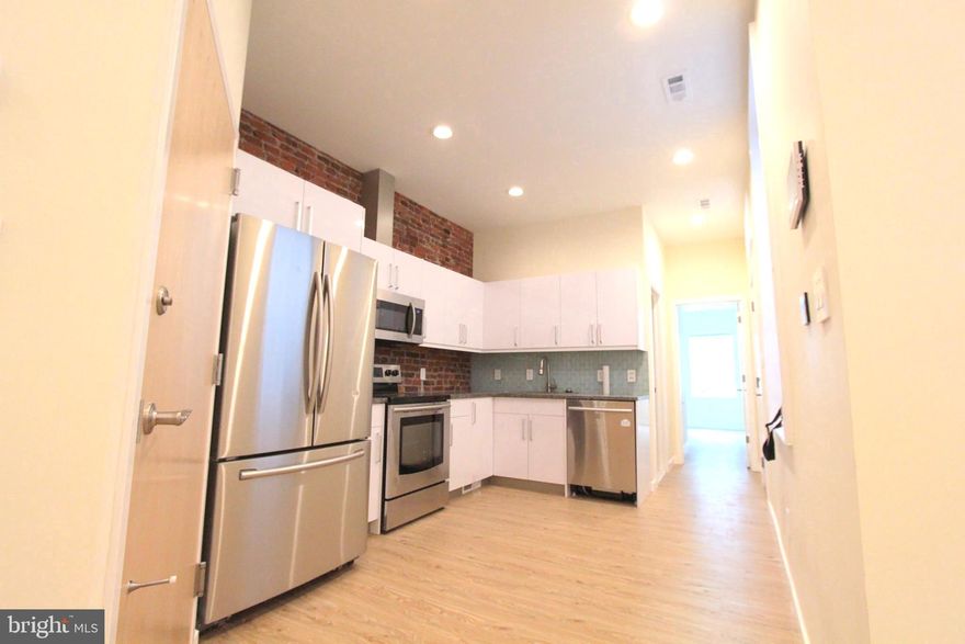 Excellent investment opportunity in great East Kensington Location.  Renovated in 2016, this modern  duplex offers 2, 2br units with outdoor space in each.  Enter through the front door to access the first floor unit.  The newer kitchen features stainless steel appliances, cabinets with ample storage space, tile backsplash & exposed brick accents. The unit also features a large dining space, with big windows and bright hardwood floors that flow throughout the apartment.  Off the kitchen is a great outdoor space for relaxing or entertaining.   The 2  well sized bedrooms each offer great closet space and contemporary lighting.  The hallway bathroom features a spacious shower with stylized fixtures and crafted glass accents. This unit has access to the basement for additional storage and laundry.  The second floor unit enters into a spacious living area. The kitchen offers stainless steel appliance, granite counters, ample cabinets and an exposed brick accent wall. The spacious rear bedroom has great closet space and en-suite full bathroom.  The well appointed 2nd bedroom and 3 peice hall bath bathroom are located in the in the front of the apartment. The unit also offer a private outdoor roof deck space with center city views. Laundry for this unit is located is in the basement of the building.  Property is fully occupied.