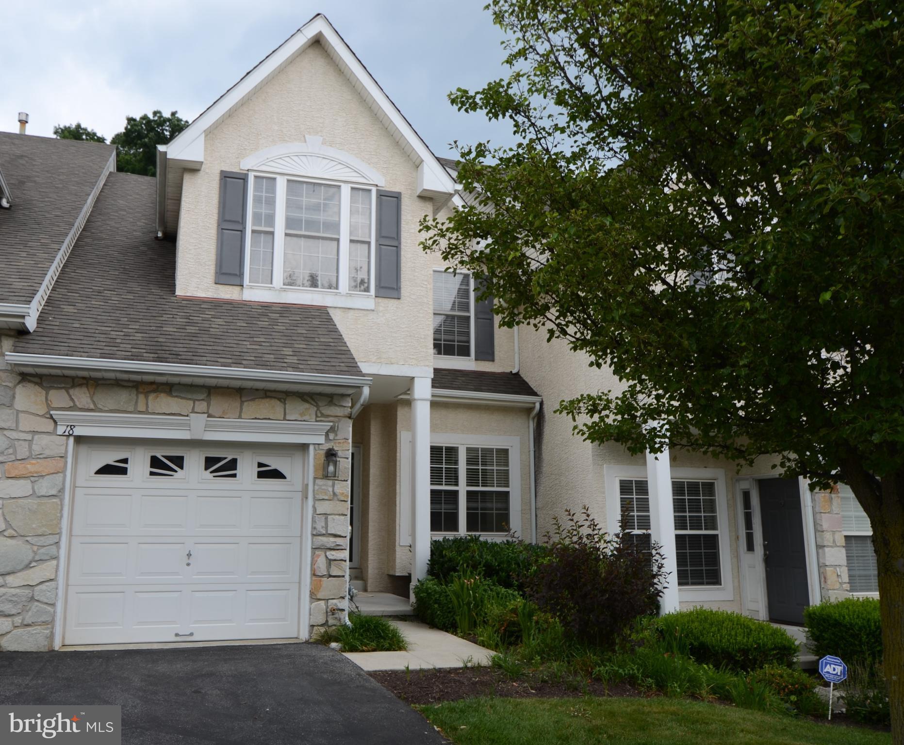 Welcome to 18 Kennedy Circle, located in Bell Tavern! This 3 bedroom 2 and a half bath townhouse in Downingtown East School District is ready for you to move into! There is a large Great Room with a gas fireplace and newly shampooed carpets. The Kitchen boasts plenty of counter space with Corian counter tops and newer Stainless Steel appliances. The slider leads you to the freshly painted enlarged deck, that backs up to woods. On the second floor you will find 3 bedrooms, the Main Bedroom has a vaulted ceiling, ceiling fan, walk-in closet and bathroom with stall shower, double vanity sinks and soaking tub. Two more bedrooms, a full bathroom and laundry complete this floor. A full basement has tons of storage and extra space with a one car garage. Near Park, shopping, entertaining, restaurants! Make your appointment today!! No pets and smoke free townhome.