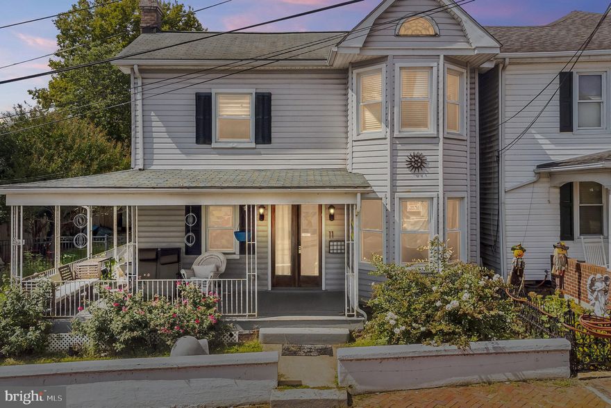 Welcome home to this 5 bedroom, 4 bathroom historic home in Brunswick. This home displays many popular turn-of-the-century architecture in its idyllic covered wrap-around porch and bay-window tower which makes it a charming and beautiful addition to the neighborhood. Inside the home you will enter the main living space with built-in bookcases and hardwood floors that extend throughout much of the main level. The dining room flows seamlessly into the spacious kitchen. Enjoy the convenience of a full bedroom and bathroom on the main level - a perfect space for guests or as the primary bedroom. On the upper level of the home you will find 4 more bedrooms and 3 full bathrooms. This home has multiple rooms that could be used for whatever you need - home office, playroom, guest room - there are so many ways to use the abundant space! The primary bedroom suite includes a beautiful bay window as well as en-suite bathroom. The property also comes with a large storage shed in the backyard. Conveniently located near shopping options as well as easy access to campgrounds along the Potomac River - this is a scenic location you don’t want to miss!