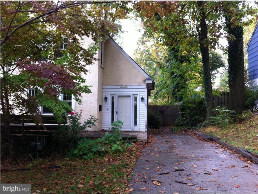 Spacious twin in popular Valley Hills awaits your special touch.  Enter into Sunroom w/tiled floor and half Bath.  Living Room with Brick Fireplace, Dining Room, Kitchen with Breakfast Bar, Mudroom with exit to rear fenced-in yard and storage shed.  2nd Floor offers three Bedrooms and hall Bath.  Third floor has fourth Bedroom with walk-in closet.  Basement unfinished with laundry.  Hardwood floors and more?Sold in As Is Condition.