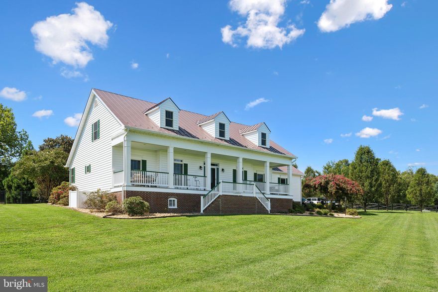 This is a stunning, must-see home in the serene Portobago Bay community! It offers an expansive layout with breathtaking scenic views that will captivate you every day! With 3 spacious bedrooms on the main level and a finished two-car garage, sitting on just over two acres of the most manicured yard you'll see, this home is designed for easy living and comfort. The open floor plan is filled with natural light from ample windows, creating bright and airy rooms that feel welcoming and warm.

The kitchen is a chef's dream, boasting top-of-the-line upgrades and gorgeous finishes that make cooking and entertaining a delight. The dining and living areas flow seamlessly together, featuring beautiful, updated flooring throughout. You’ll also find the largest pantry you’ve ever seen and a separate laundry room for added convenience. The split bedroom design offers privacy, with bedrooms 2 and 3 connected by a convenient Jack and Jill bathroom. 

Step outside to your screened-in porch, perfect for relaxing with your morning coffee or evening glass of wine. It opens to a fenced backyard—an ideal spot for kids and pets to play safely. Head upstairs to discover a massive recreation room and a 4th bedroom that is currently used as a gym space that includes a luxury full bath with a soaking tub you'll love to unwind in. The crawl space, almost like a basement with its tall ceilings, provides ample storage and is newly conditioned for peace of mind. Well taken care of and too many updates to mention! Tankless water heater! 

This home offers access to fantastic community amenities: enjoy beach days, a boat ramp, a fishing pond, and a picnic area, all set along the picturesque Rappahannock River. Located just 30 minutes from Fredericksburg and 20 minutes from Dahlgren, Bowling Green, or the Spotsylvania Commuter Rail Line, you're never far from everything you need.

Upstairs was completely finished by Dannex Contruction in 2015, tankless water heater, pressured well tank replaced in 2022, new fencing 2024, The Drying Company encapsulated huge crawl space 2022, newer HVAC units, new Prolift Garage door 2023, leaf filter gutters 2023, Rainsoft water system, driveway sealed 2024 and so much more has been updated to this home.

Don't miss out on the chance to live in the peaceful and beautiful neighborhood of Portobago Bay!  This home comes with an assumable 2.25% mortgage, offering significant savings! Schedule your showing today and start living your dream life by the river!