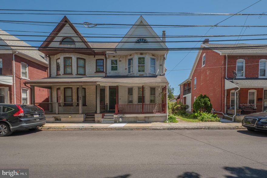 There’s tons of space to make your own in the twin home located in the Borough of Emmaus and East Penn School District. This home is ready for your personal touch and updates. The first floor has a large living room, dining room, and sizeable eat-in kitchen with a wall of original built-in farmhouse style cabinets. There is an enclosed back porch and laundry room also on the first floor. The second floor has three bedrooms with closets, one a walk-in, and a full bath. The third-floor attic provides the possibility for an additional bedroom, living space, or storage. Additional features include the basement, fenced backyard, two-car garage, parking pad, and covered front porch. Convenient to the downtown farmer’s market, restaurants, shopping, and local schools.