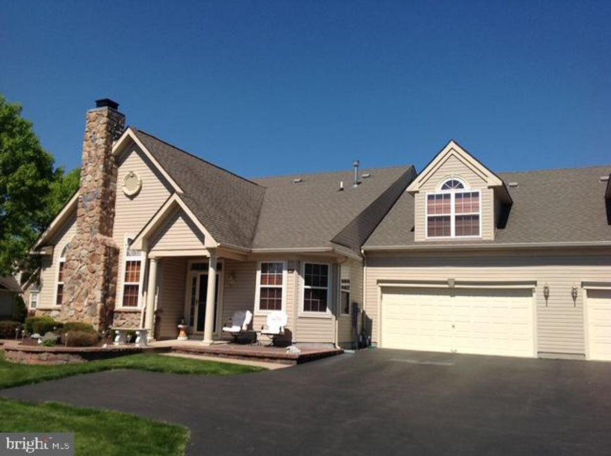 Don't miss out! Welcome to 627 Bellflower Rd, in the popular 55+ community of Flowers Mill. Upon entering you will immediately notice the open and airy combination living room / dining room which features catherdral ceilings, custom drapes, upgraded hardwood floors throughtout. Beyond the living room you will find the kitchen and a sunny breakfast nook. The kitchen features upgraded  42" cabinets, gas cooking,  and full backsplash.  From the kitchen you'll have access to the first-floor, enclosed, laundry area and 2 car-garage with an additional storage area. 
 The main level also holds the large primary bedroom with private bathroom.  In addition to the walk-in closet, there is an additional double closet, and catherdral  ceiling. The 2nd bedroom is ideal for an office space or additional bedroom.  As an extra bonus, this Realen model has a finished loft.   This bonus space has so much potential!  It could be a 3rd bedroom / studio for an adult child, an office, playroom for grandchildren, or even just the ultimate storage space that anyone downsizing will truly appreciate. The roof was replaced in 2022 and the HVAC was replaced in April 2017.   Enjoy all of the activities that Flowers Mill has to offer including a recently updated clubhouse, indoor pool, tennis courts, bocce, pickle ball courts, walking trails and a calendar full of events.